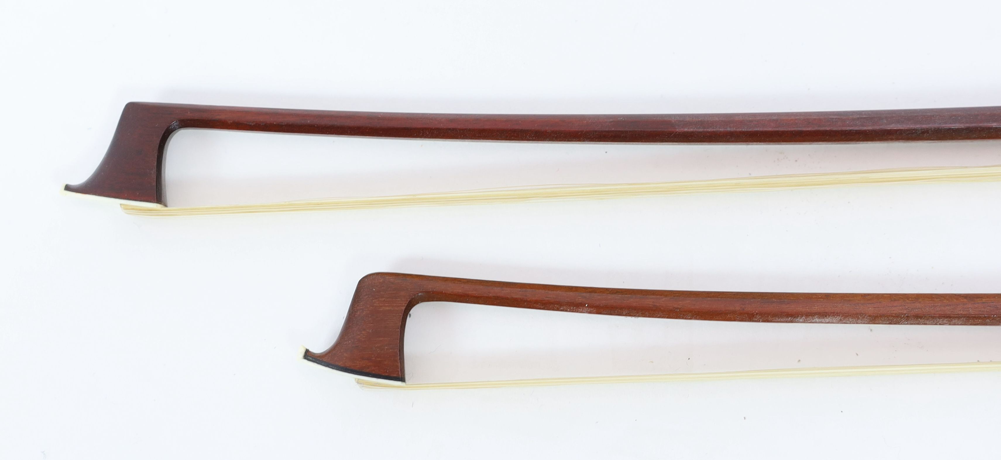 Two stamped violin bows, Both 74.5 cm long